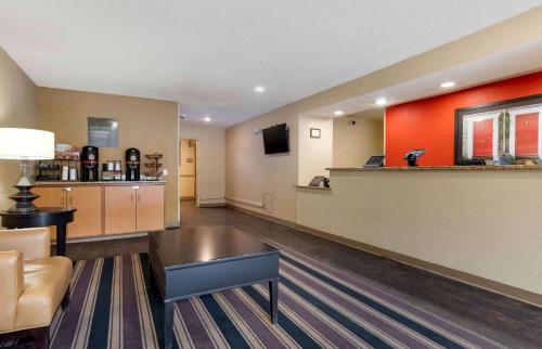 a living room with a couch and a table at Extended Stay America Suites - Austin - Metro in Austin