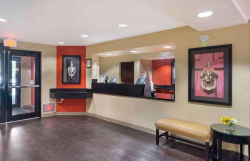 a lobby with a waiting area with a dog in a mirror at Extended Stay America Suites - Seattle - Lynnwood in Lynnwood