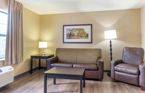 a living room with a couch and a chair at Extended Stay America Suites - Seattle - Lynnwood in Lynnwood