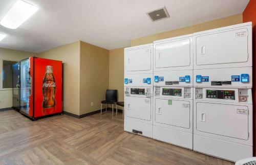 a room with a coke machine and a soda machine at Extended Stay America Suites - Seattle - Kent in Kent