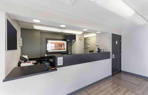 a lobby of a hotel with a reception desk at Extended Stay America Select Suites - Denver - Cherry Creek in Denver