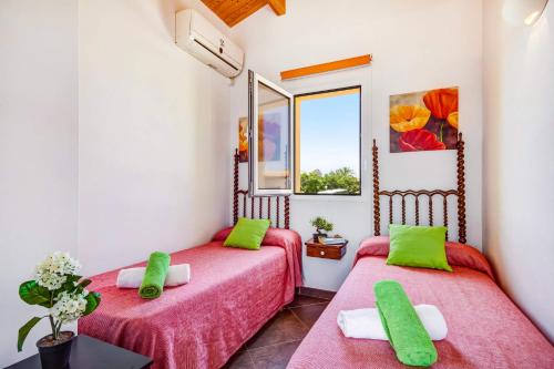 Ένα ή περισσότερα κρεβάτια σε δωμάτιο στο Villa Urano by Villa Plus