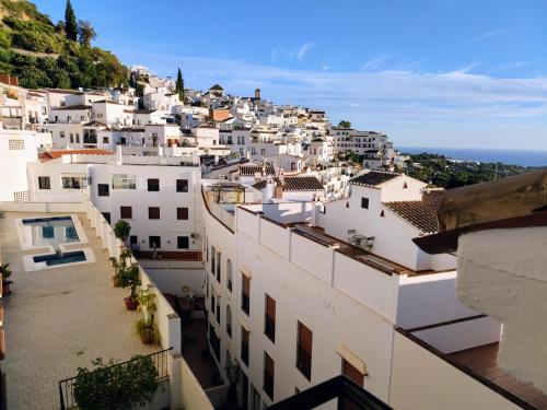 a view of a town with white buildings at Santo Cristo 11 in Frigiliana