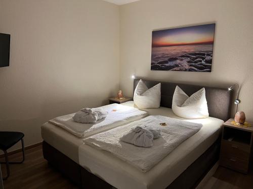 Posteľ alebo postele v izbe v ubytovaní Ferienwohnung Sandra
