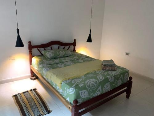 Ένα ή περισσότερα κρεβάτια σε δωμάτιο στο Punta Cocos
