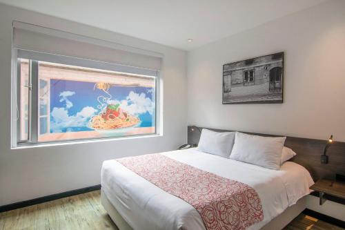 Postel nebo postele na pokoji v ubytování Hotel B3 Virrey