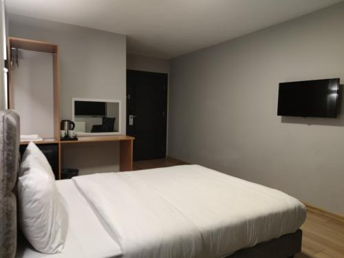 Televisyen dan/atau pusat hiburan di Olen Uskudar Hotel