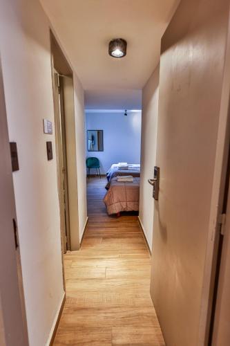 Postel nebo postele na pokoji v ubytování M383 Hotel Bariloche