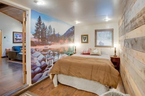 a bedroom with a bed and a large painting on the wall at Stateline Home about 2 Mi to Tahoe Beaches in Stateline