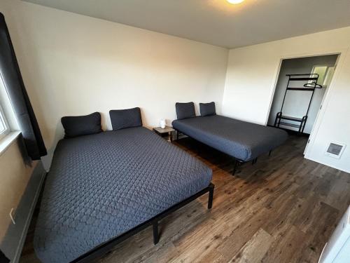 Ένα ή περισσότερα κρεβάτια σε δωμάτιο στο Sea Echo Motel