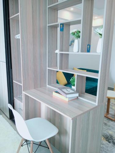 a room with a desk and a chair and a mirror at Wanderstay kenya in Nairobi