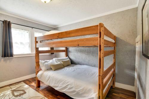 a bedroom with two bunk beds in a room at Charming Portland Home, Walk to Light Rail! in Milwaukie