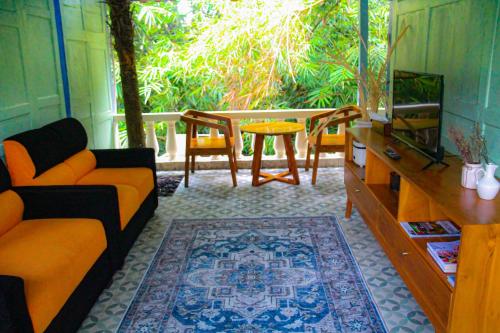 Area tempat duduk di Villa Kamar Tamu Selomartani 2