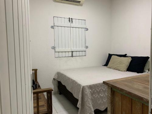 Tempat tidur dalam kamar di Casa de Campo em Haras