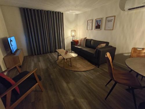 Ruang duduk di Vakantiewoningen Eyveld
