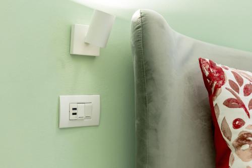 Una cama o camas en una habitación de GLAM PARMA