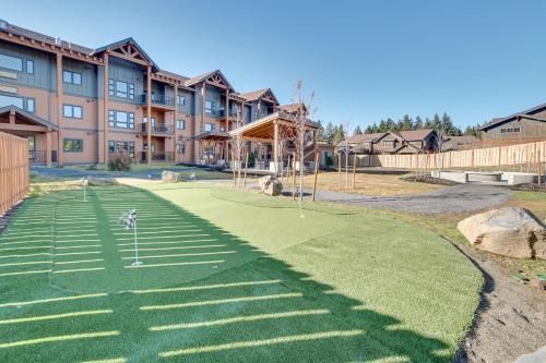 a miniature golf course in front of a building at Suncadia Resort Condo Balcony and Golf Course Views in Cle Elum