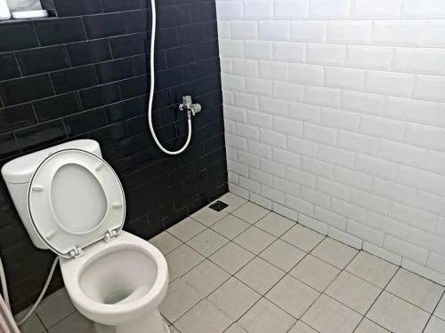 Kylpyhuone majoituspaikassa Baruga House