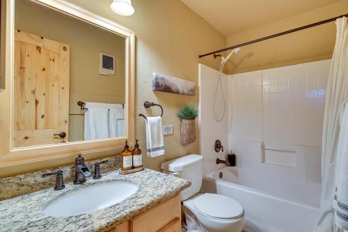 A bathroom at Inviting Nutrioso Cabin with Wraparound Porch!