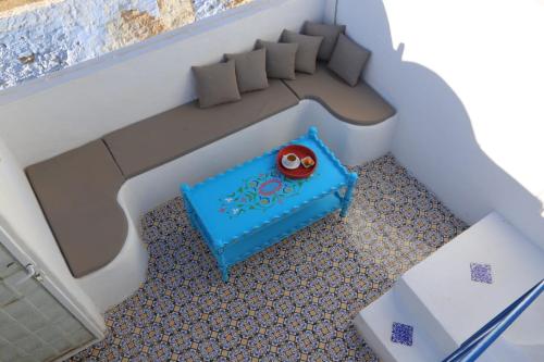 a model of a couch in a boat at Dar Azur Hammamet Guest House in Hammamet