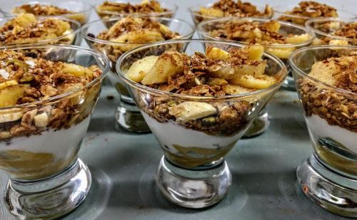 a group of desserts in glass cups on a table at Sheridan House Inn- Adult Only Accommodation in Williams
