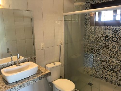 Koupelna v ubytování Ao som do mar Bahia