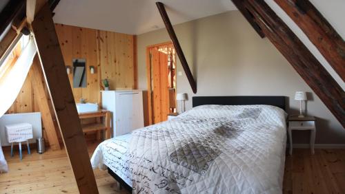 Giường trong phòng chung tại Bed & Breakfast De Stolp