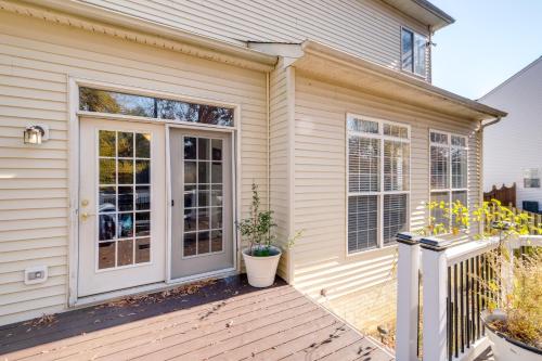 a front door of a house with a potted plant at Springfield Sanctuary with Spacious Deck! in Springfield