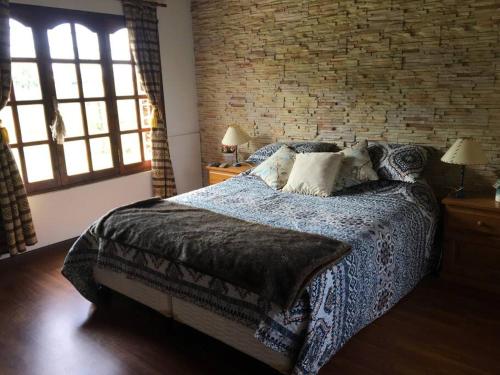 Ένα ή περισσότερα κρεβάτια σε δωμάτιο στο Casa completa Playas del Sur MdP Barrio SAN JACINTO CALLE 433 y 16 Consulte disponibilidad antes de reservar Estadia minima 5 noches