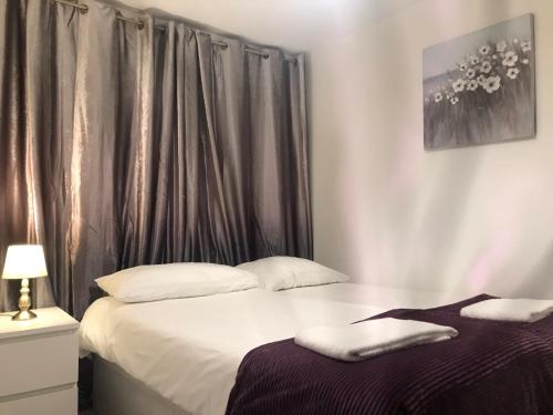 Postel nebo postele na pokoji v ubytování St Marks Lodge Clacton-On-Sea