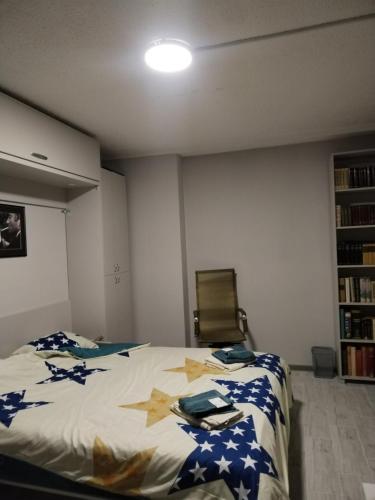 Rúm í herbergi á Weekend varijanta Plus