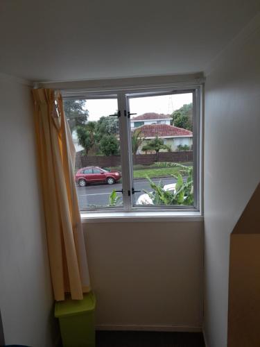 a window in a room with a view of a street at Mablet Family Home Stay in Auckland