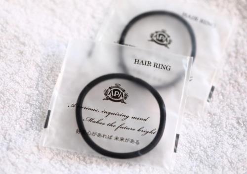 a pair of earrings sitting on a piece of paper at APA Hotel Ishigakijima in Ishigaki Island