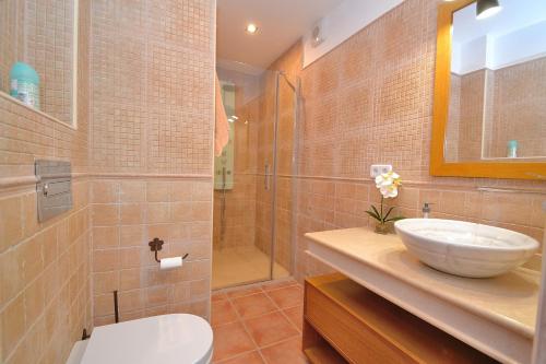 a bathroom with a sink and a shower at 066 Villa Mexic 41 ETV8816 by Mallorca Charme in Santa Margalida