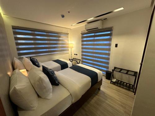 Postel nebo postele na pokoji v ubytování Coron 180 Hotel