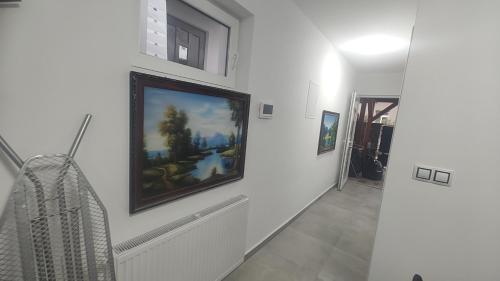 Una televisión o centro de entretenimiento en Vu's Home