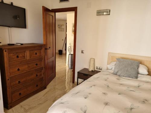 A bed or beds in a room at Panorama Park, Punta Prima, 5 star Luxury 2 bedroom Apartment like no other