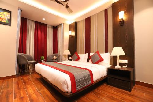 Postel nebo postele na pokoji v ubytování Hotel The Magic Tree - Paharganj New Delhi