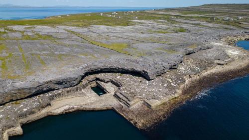 an aerial view of an island in the ocean at Aran Walkers Lodge in Inis Mor