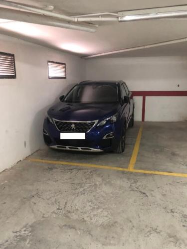 a car parked in a parking garage at Casa Rincón de Broto in Broto