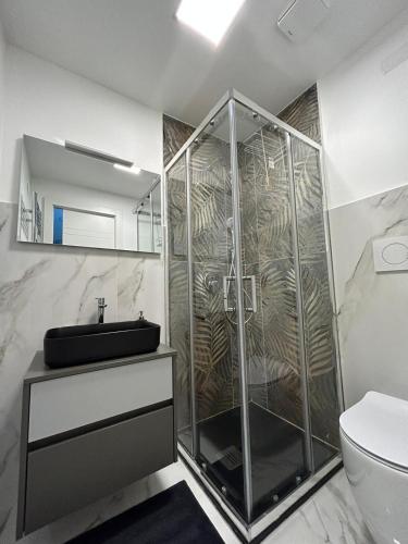 Casa vacanze 1702, con la camera matrimoniale con il bagno privato e un soggiorno comune