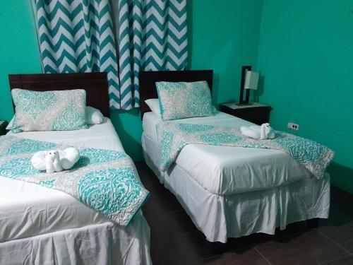 Tempat tidur dalam kamar di Bailey's Bed and Breakfast