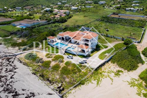an overhead view of a large house on the beach at 10 bed-rooms luxury BEACH VILLA in Guana Bay