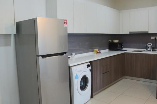 Η κουζίνα ή μικρή κουζίνα στο Sausana Suites D' Bliss