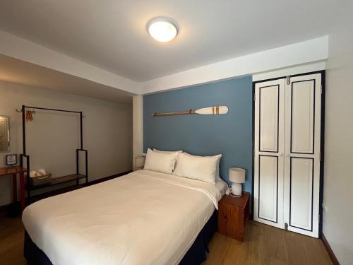 Katil atau katil-katil dalam bilik di Nautical Home & Seashell House B&B
