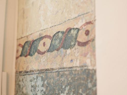 a brick wall with the words coppo on it at Gästehaus im Schlosspark in Saffig