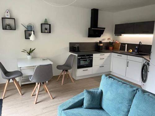Kuchyň nebo kuchyňský kout v ubytování Neu sanierte Wohnung für 2-4 P