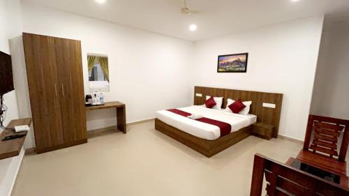 Cama o camas de una habitación en Hotel Dream Suite, Kattappana