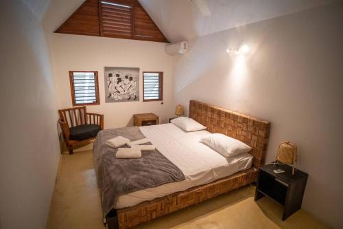Postel nebo postele na pokoji v ubytování Adorable villa caribéenne à 300 mètres de la plage