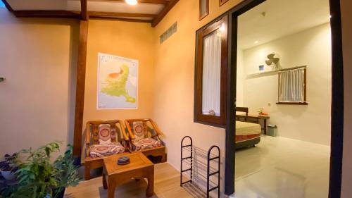 Posezení v ubytování Nitha Homestay